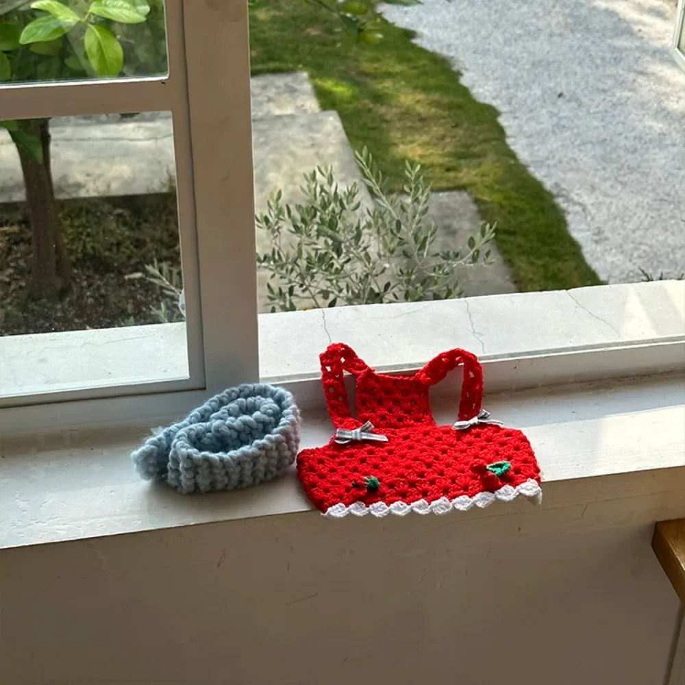 Knitted Cherry Vest and Black Dress